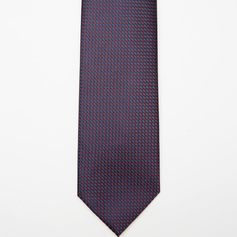 Tokyo Tie in blue micro pattern, flat lay on a plain background