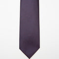 Tokyo Tie in blue micro pattern, flat lay on a plain background