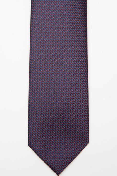 Tokyo Tie in blue micro pattern, flat lay on a plain background