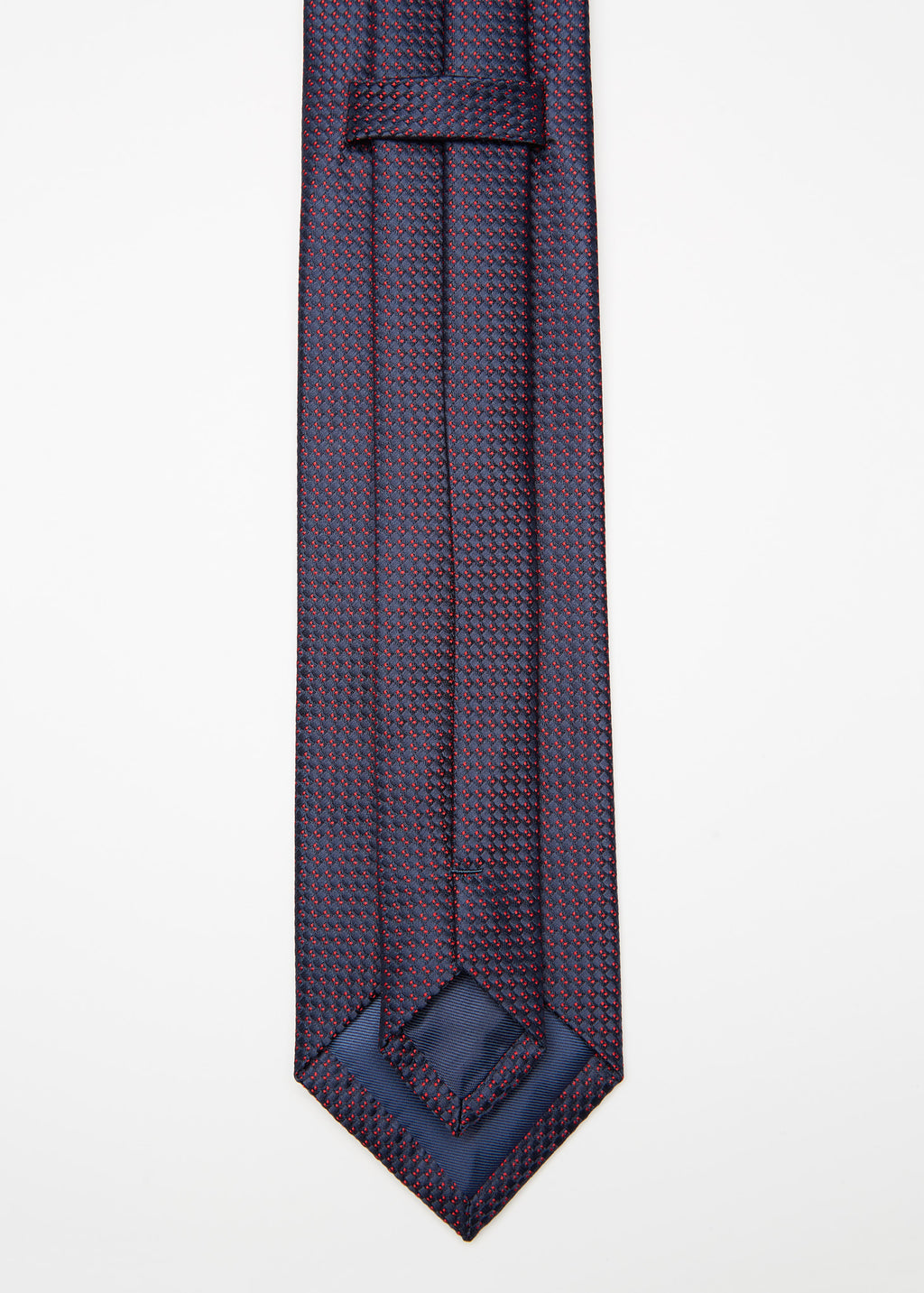 Close-up of Tokyo Tie blue micro pattern weave, showing the keeper loop and tip