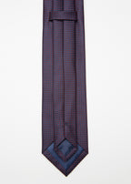 Close-up of Tokyo Tie blue micro pattern weave, showing the keeper loop and tip