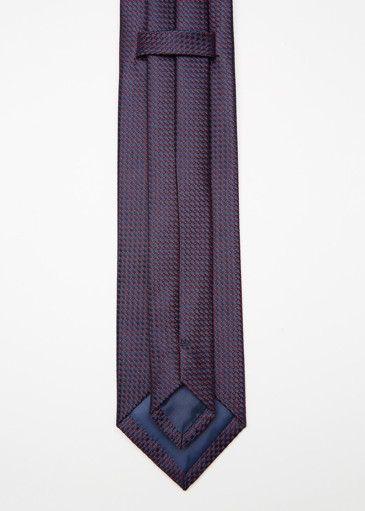 Close-up of Tokyo Tie blue micro pattern weave, showing the keeper loop and tip
