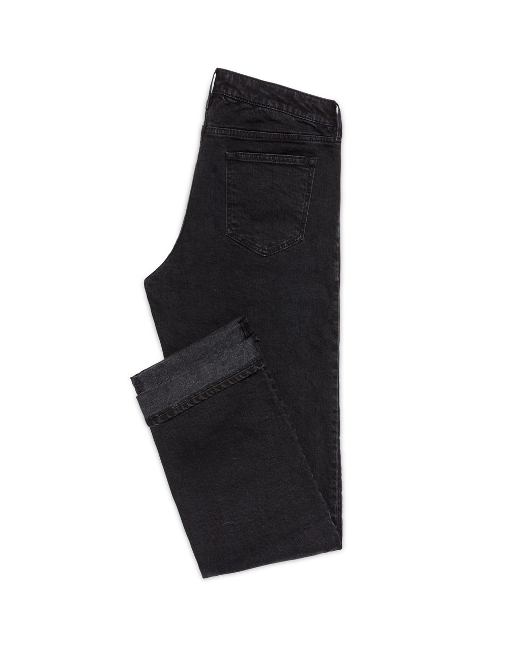 Black Stretch Jeans, flat lay side view with the cuffed hem turned up