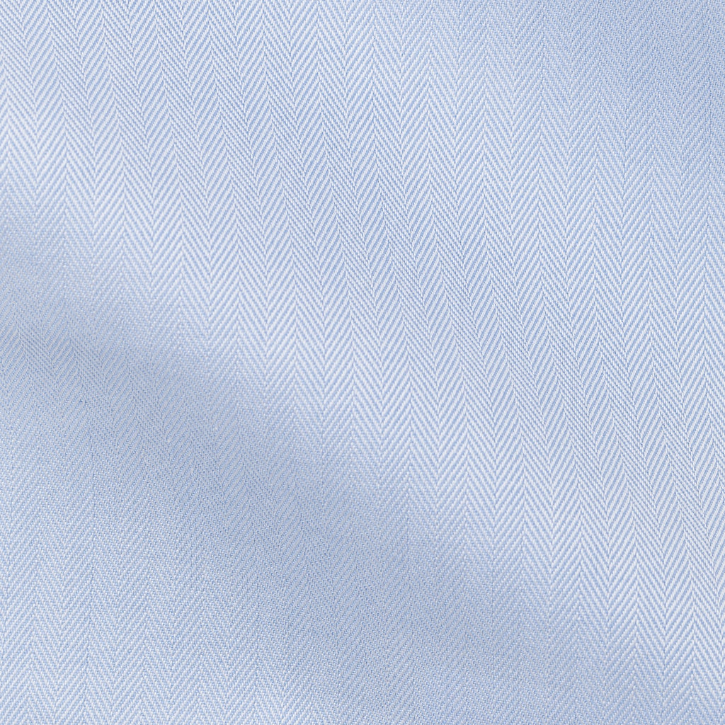 Close-up of the light blue herringbone weave fabric texture