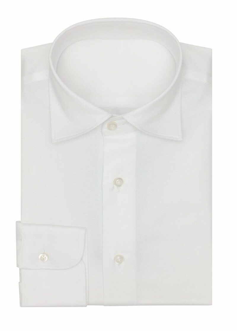 The Perfect Cotton White Shirt folded flat with collar and button placket, front view