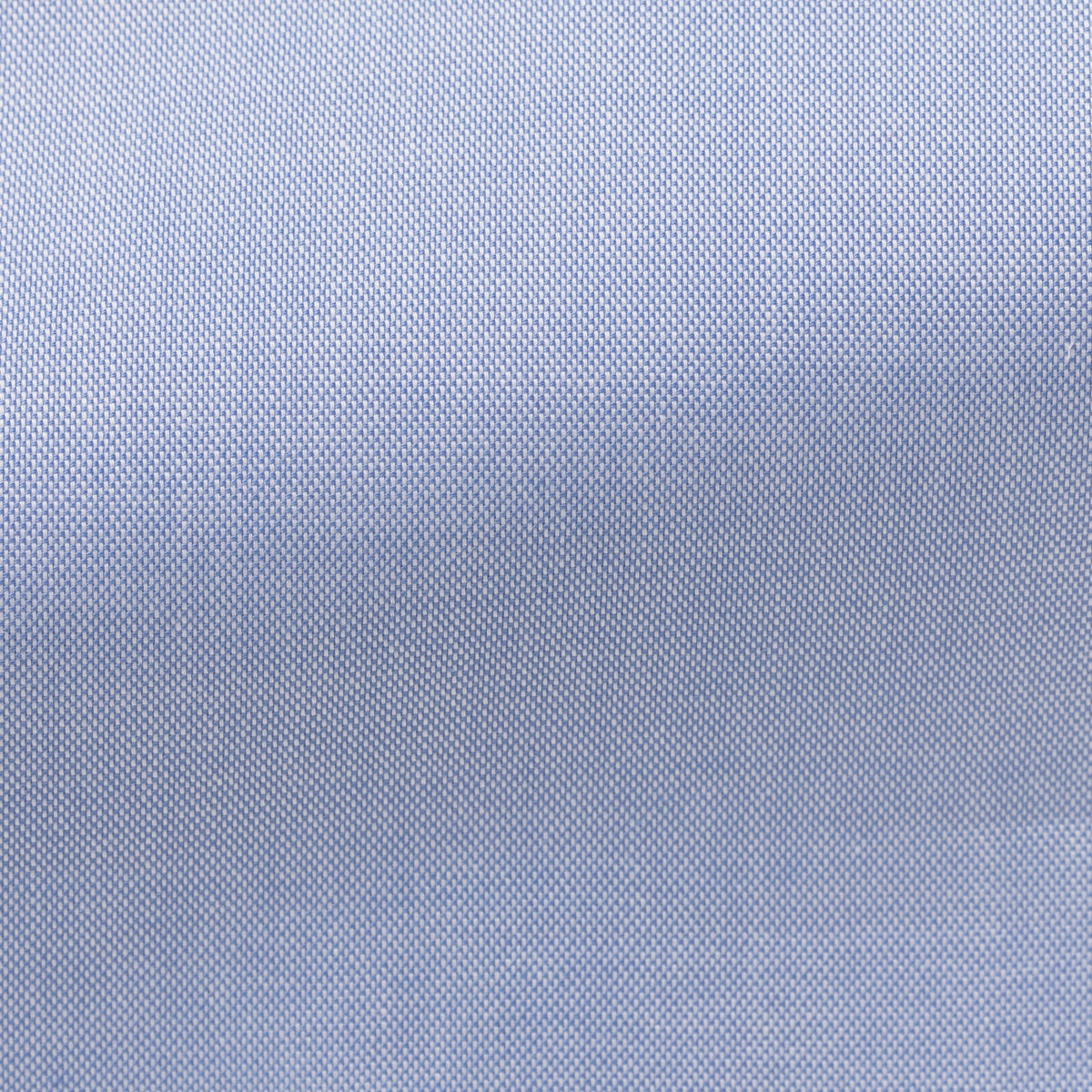 Extreme close-up of the Oxford Mid Blue Shirt's woven fabric texture