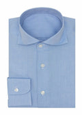 Oxford Mid Blue Shirt folded flat, showing the collar, button placket and cuff