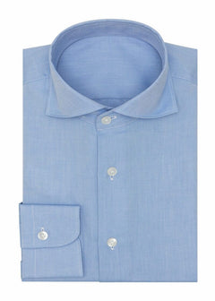 Oxford Mid Blue Shirt folded flat, showing the collar, button placket and cuff