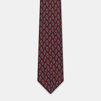 Taipei Tie in a burgundy paisley print, flat lay close-up of the blade tip