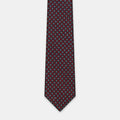 Boston Tie in a navy floral medallion print, laid flat in full length