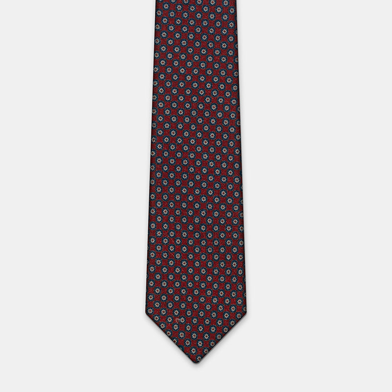 Boston Tie in a navy floral medallion print, laid flat in full length