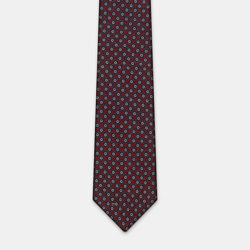 Boston Tie in a navy floral medallion print, laid flat in full length