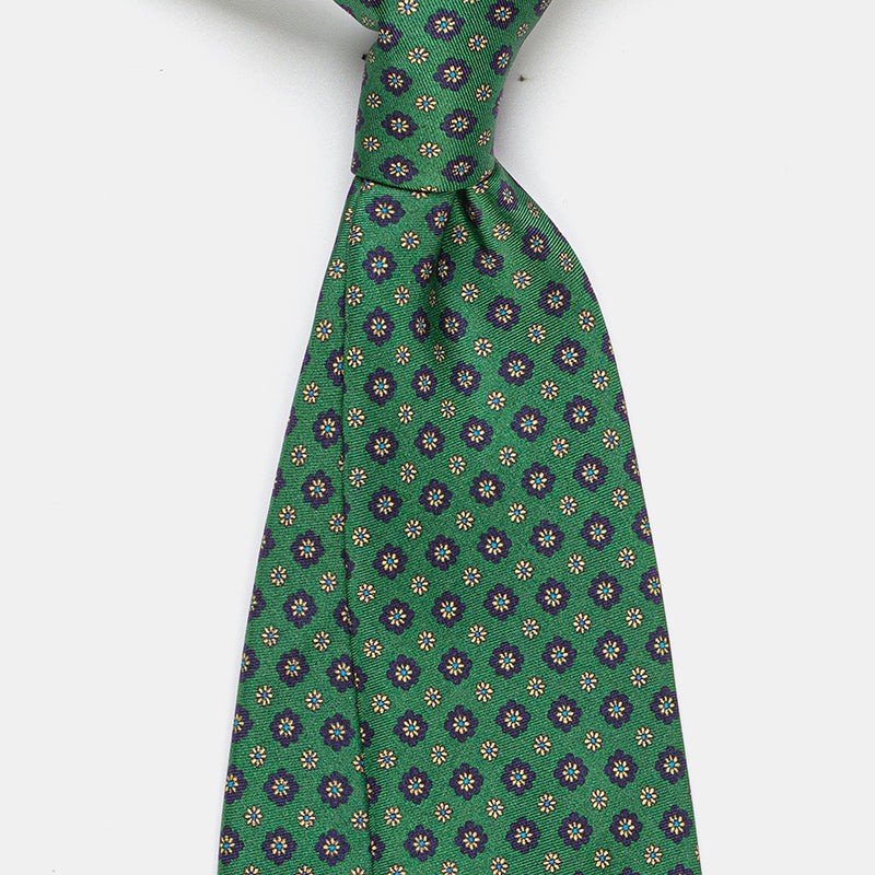 Seattle Tie in a green floral medallion print, close-up detail of the knot
