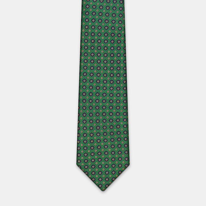Seattle Tie in a green floral medallion print, laid flat in full length