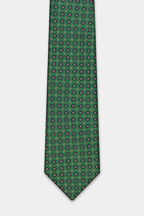 Seattle Tie in a green floral medallion print, laid flat in full length