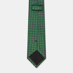 Seattle Tie in a green floral medallion print, angled view of knot and tip