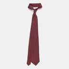 Riga Tie in a burgundy floral medallion print, knotted and hanging straight
