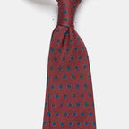Riga Tie in a burgundy floral medallion print, angled close-up of the knot