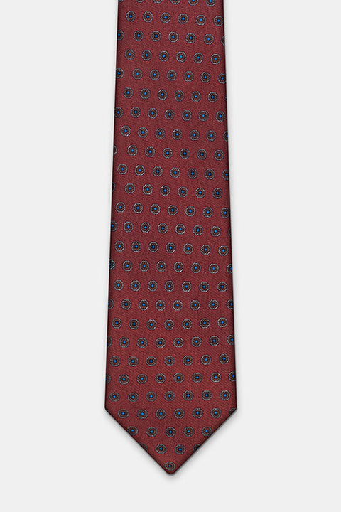 Riga Tie in a burgundy floral medallion print, laid flat in full length
