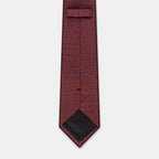 Riga Tie in a burgundy floral medallion print, keeper loop and tip visible