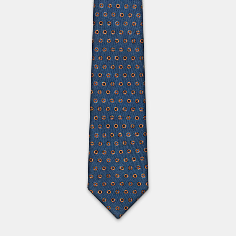 Oslo Tie in a blue floral medallion print, laid flat in full length
