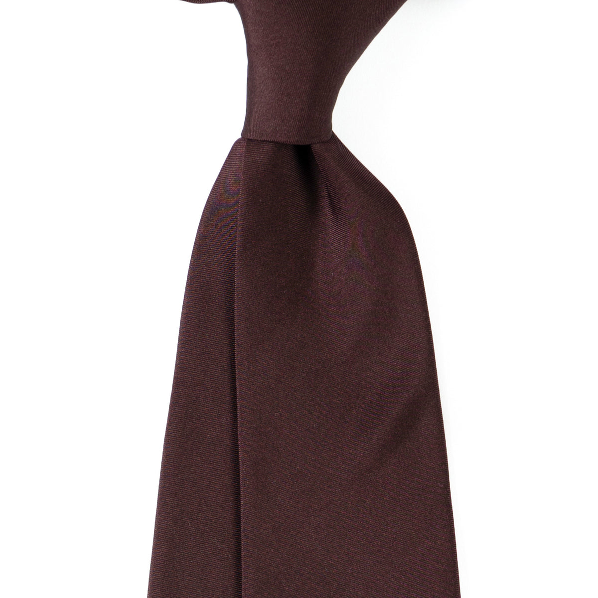 Brussels Tie in solid burgundy, angled close-up view of the knot