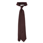 Brussels Tie in solid burgundy, knotted and hanging in full length