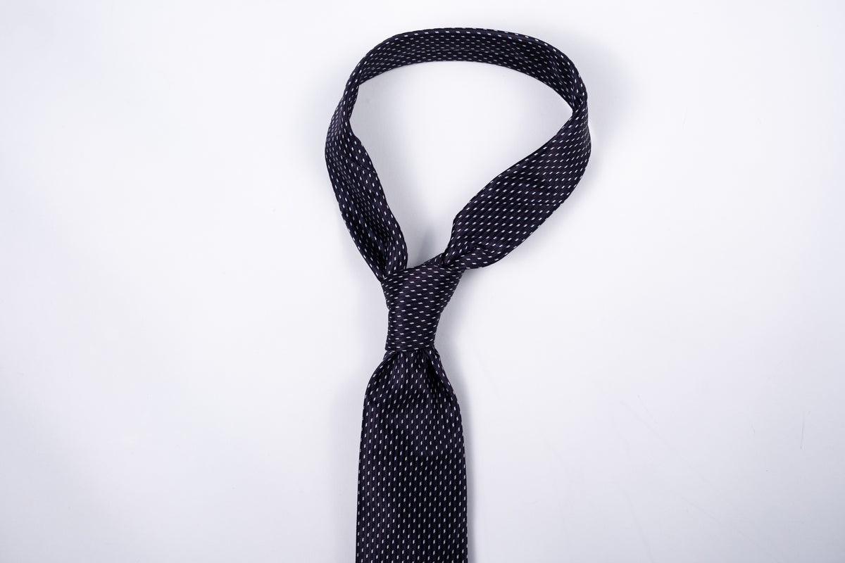 Berlin Tie - Black Micro Dot, THEODORE silk tie, tied knot front view