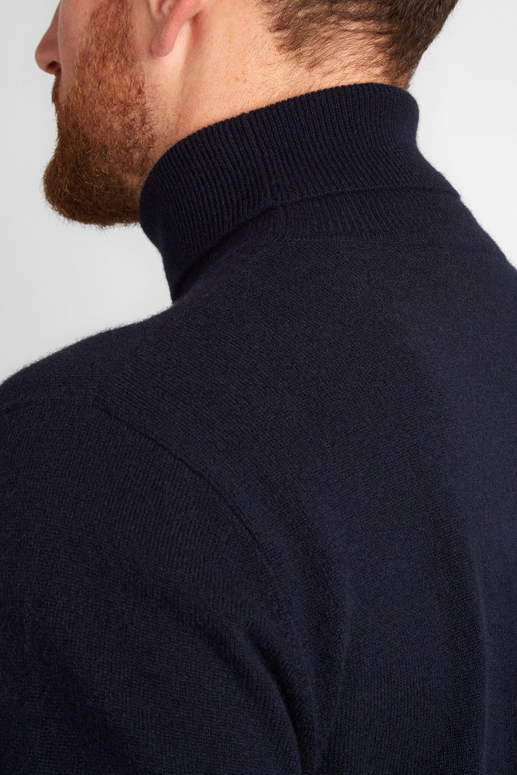 Irish Coffee Turtleneck Navy, back view close-up of the neck and shoulder