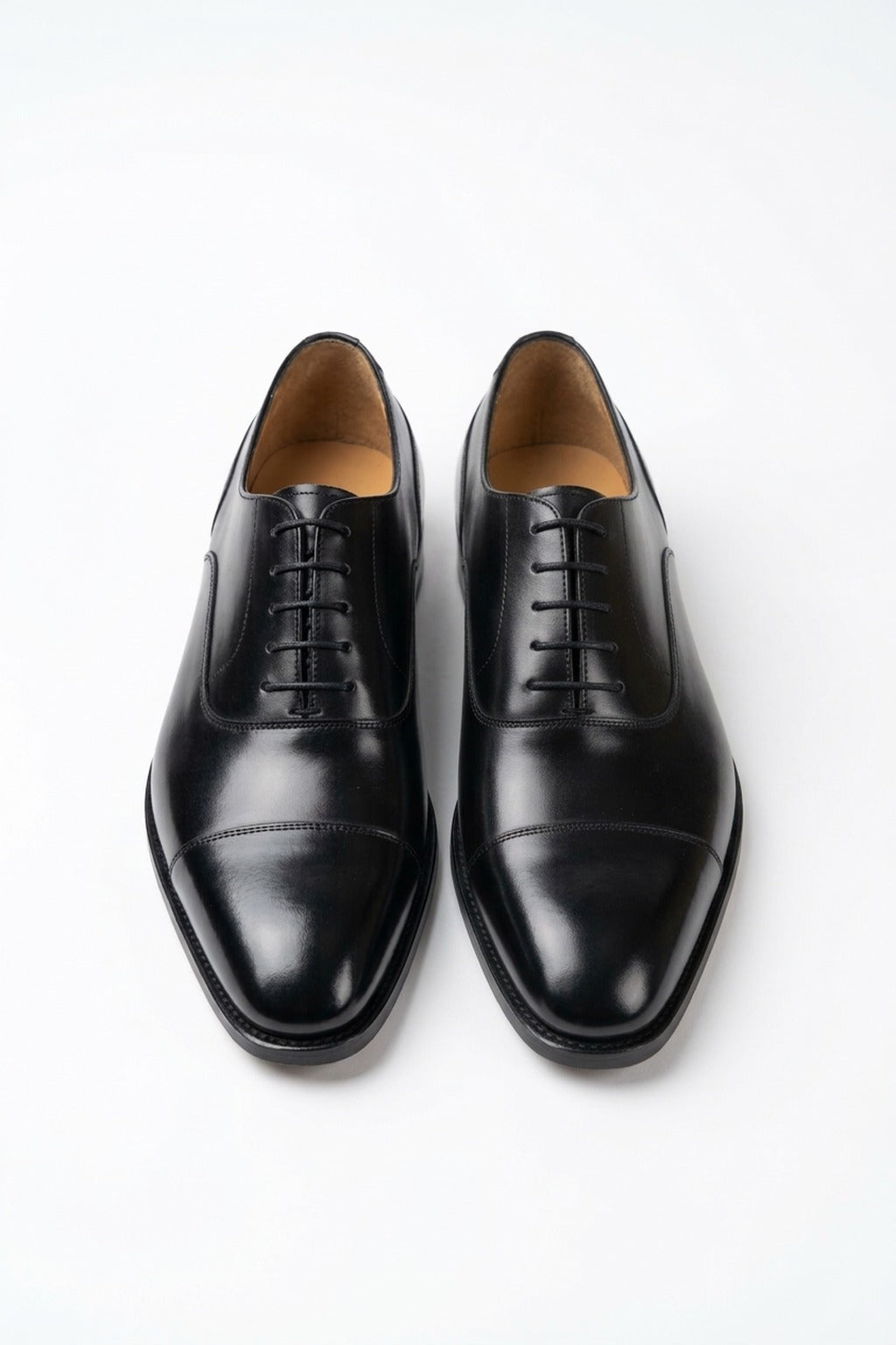 The Konbanwa Square-Toe Triple-Stitched Black Oxford, pair from the front in the studio