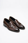 The Lukas Dark Brown Leather Tassel Loafer, pair in the studio
