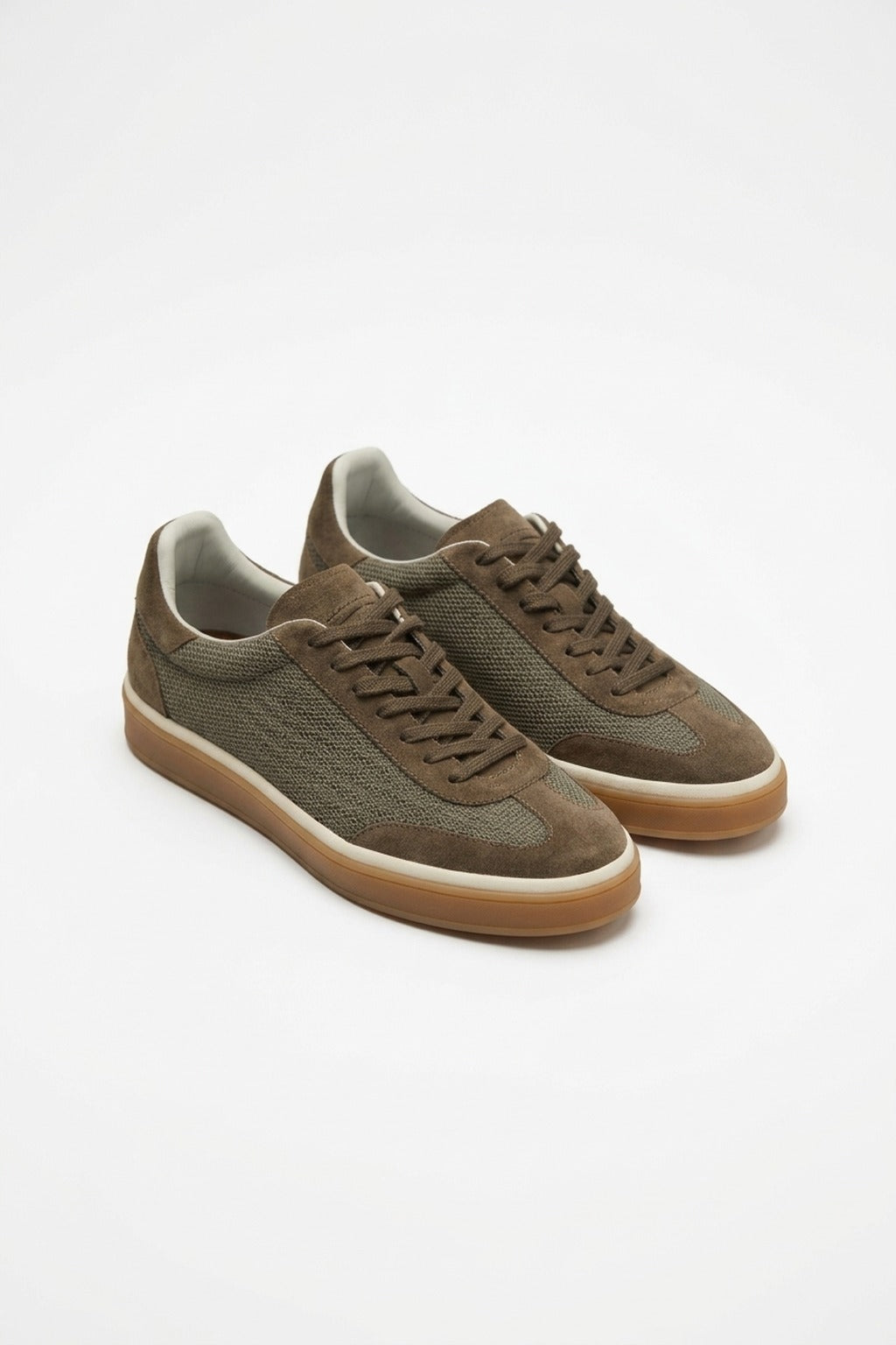 The Riva Brown Suede Sneaker, pair in the studio