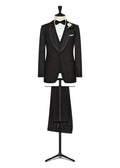 Champs-Elysees Black Tuxedo with shawl lapel on a mannequin, bow tie and boutonniere