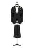 Acorn Street Black Wool Tuxedo displayed on a tailor's dress form with a bow tie