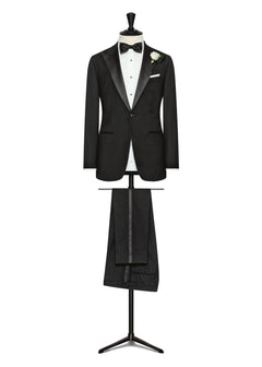 Acorn Street Black Wool Tuxedo displayed on a tailor's dress form with a bow tie