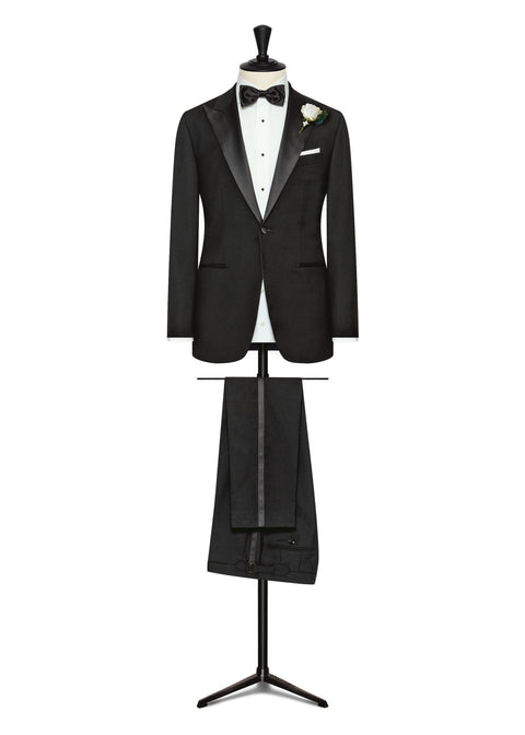 Acorn Street Black Wool Tuxedo displayed on a tailor's dress form with a bow tie